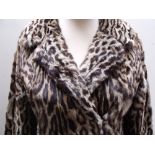 A STYLISH VINTAGE LADIES OCELOT FUR JACKET, fully lined, label reads 'S Jaffa Furs Ltd.,