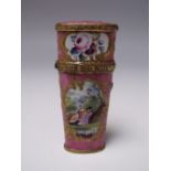 A CONTINENTAL ENAMEL ETUI, fully fitted with gilt scissors etc., pink ground with painted panels