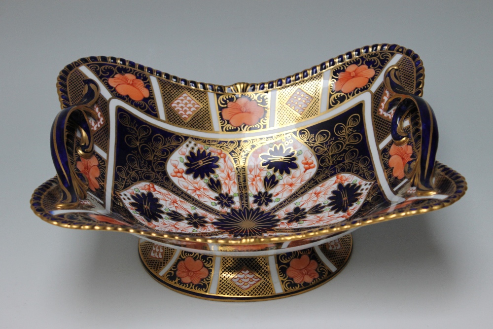 A LARGE ROYAL CROWN DERBY IMARI TWIN HANDLED FOOTED BASKET, with scrolling handle design, W 29 cm