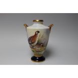 AN AYNSLEY HAND PAINTED TWIN HANDLED URN VASE BY J SHAW - 'THE PTARMIGAN', featuring two birds