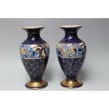 A PAIR OF BURSLEY WARE VASES, in a Rhead style with a crazed geometric styling above and below a