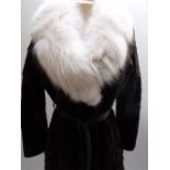 A LADIES FULL LENGTH RICH MAHOGANY BROWN FUR COAT, with contrasting sheepskin fur collar, front