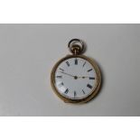 AN 18K GOLD OPEN FACED MANUAL WIND POCKET WATCH, having white enamel dial, Roman numeral hour