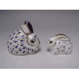 TWO ROYAL CROWN DERBY RABBIT PAPERWEIGHTS, comprising 'Large Rabbit' and 'Baby Rabbit', both first