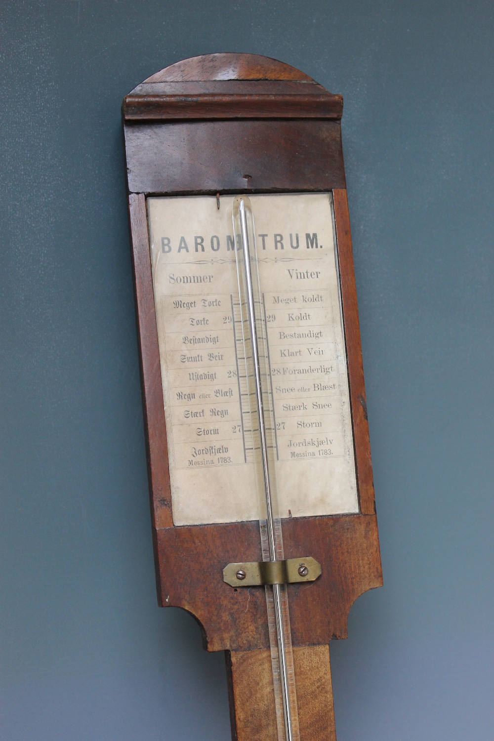 A DUTCH MAHOGANY STICK BAROMETER, the arched top above a paper scale, rectangular cistern cover with - Image 2 of 2