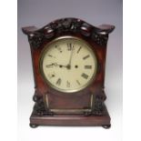 A LARGE MAHOGANY CASED TWIN FUSEE TABLE CLOCK, circular dial with Roman numerals, movement