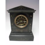 A BLACK SLATE MANTEL CLOCK OF ARCHITECTURAL FORM, the black chapter ring with gilt Roman numerals