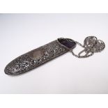 A HALLMARKED SILVER EMBOSSED SPECTACLE CASE WITH CHATELAINE MOUNT - LONDON 1898, maker's mark for