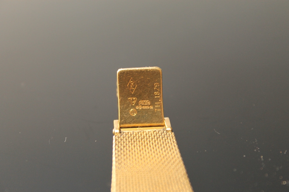 OMEGA - A RARE 18 CARAT GOLD DEVILLE WRISTWATCH, having stripped two tone gold dial, hour baton - Image 2 of 3