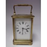 A FRENCH BRASS CASED CARRIAGE CLOCK BY HENRI JACOT, gilt brass cornice case, enamel dial with