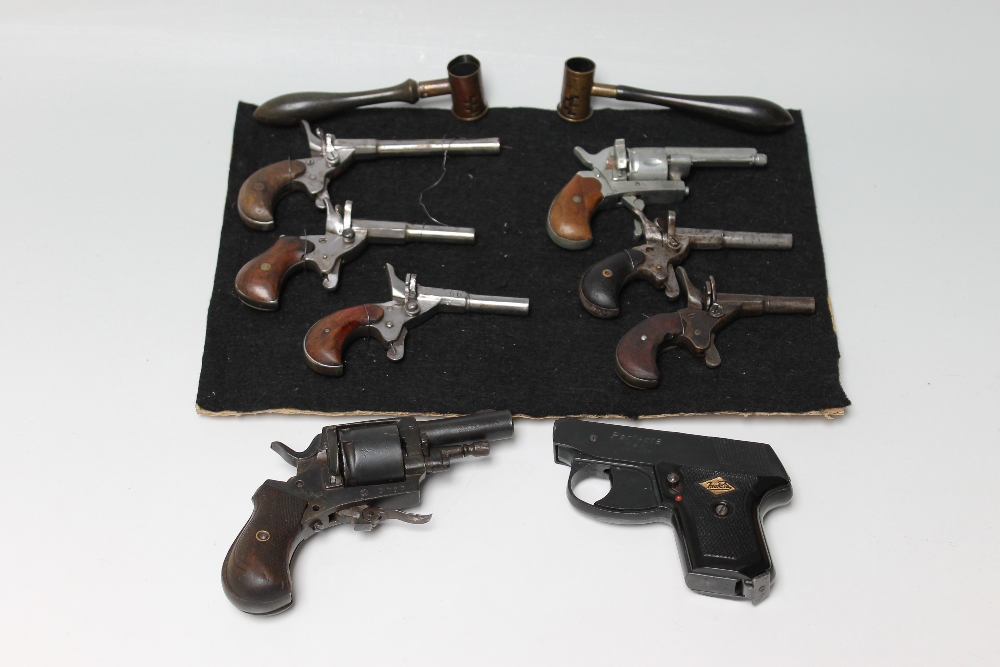 A COLLECTION OF SIX OBSOLETE BELGIAN PIN FIRE MUFF PISTOLS AND A BELGIAN BULLDOG POCKET REVOLVER,