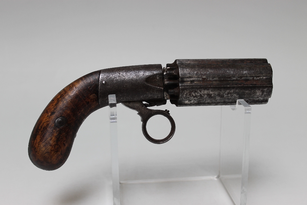 AN ANTIQUE 6 SHOT PEPPERBOX REVOLVER, with 3" long 10 mm barrels, maker's detail unclear, working