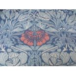 AN EARLY 20TH CENTURY WILLIAM MORRIS WOVEN WOOL CURTAIN PANEL / HANGING, dark blue ground with the