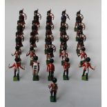 A COLLECTION OF BRITAINS METAL SOLDIERS, depicting the Scots Guards marching band (approx 26)