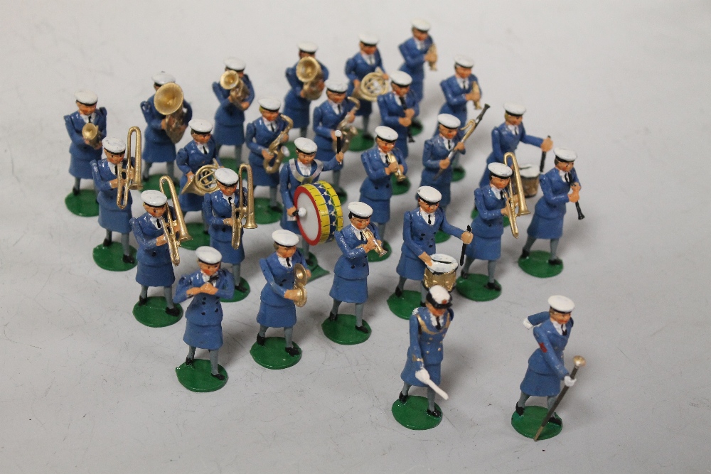 A COLLECTION OF REPRODUCTION METAL SOLDIERS OF MARCHING BANDS including Women's Royal Canadian Naval