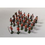 A COLLECTION OF BRITAINS METAL SOLDIERS, depicting the West Surrey regiment marching band (approx