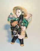 Kleiner Mexikaner auf Eselchen  - Groteskenfigur aus GmundenRoter Scherben mit Unterglasurbemalung