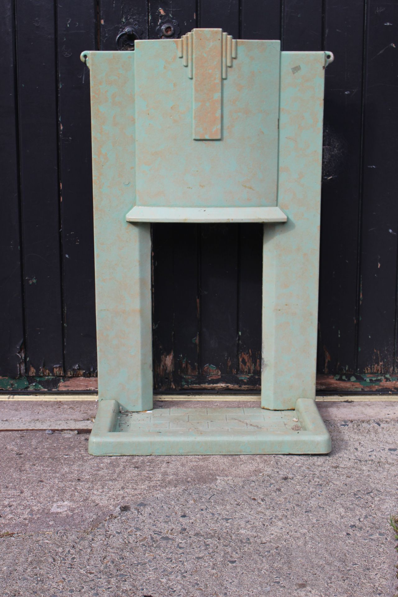 vintage cast iron fire place in mint green