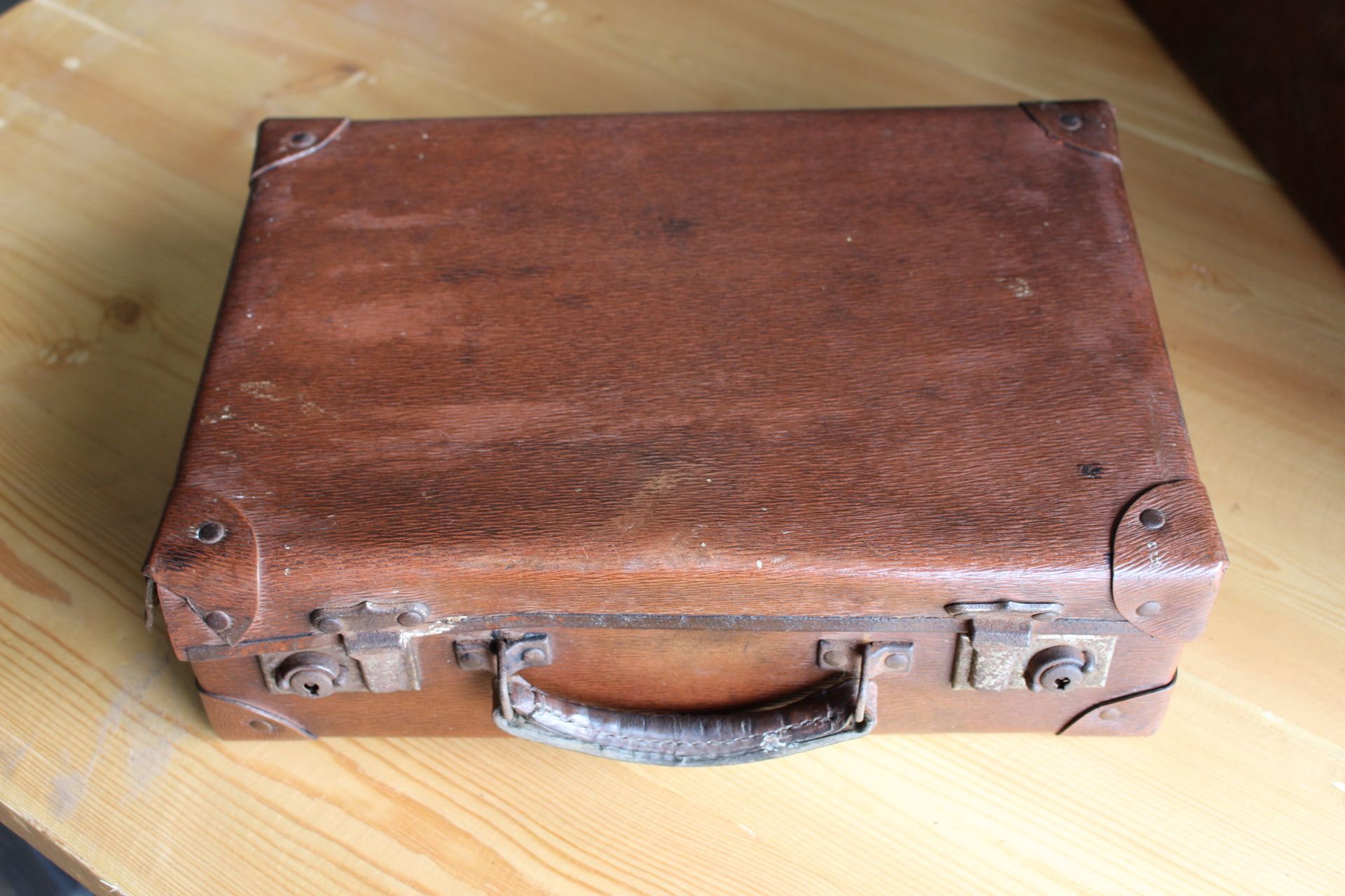 brown leather suitcase