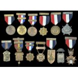 A collection of twelve National Rifle Association and related medals awarded to G. N. Baumann N.R.