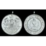 South Devon Militia Medal of Merit 1799, obverse: trophy of arms enclosed by a wreath, with the