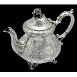 Major J. T. Carpenter-Garnier, M.C., The Scots Guards A Sterling silver ornately decorated teapot,
