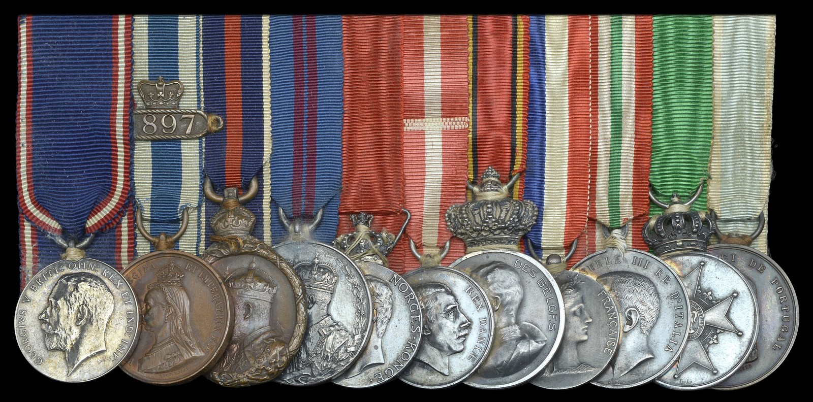 An impressive R.V.M. group of eleven awarded to Mr. George Woods, Stores Clerk, Master of the