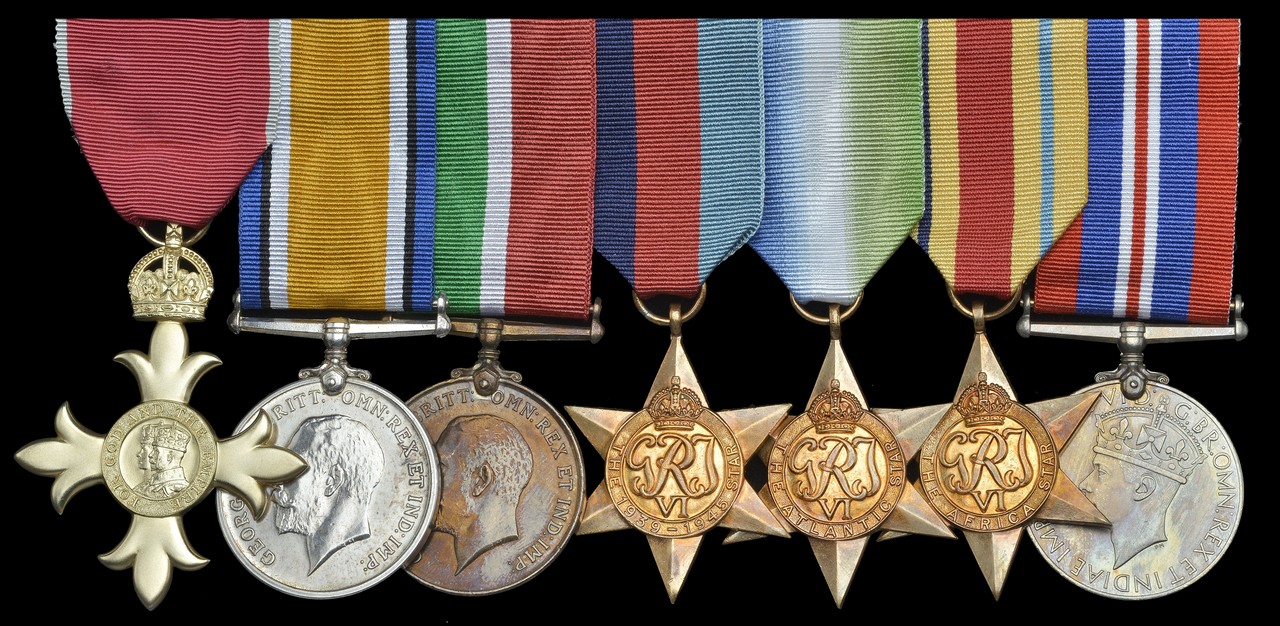 A Second World War O.B.E. group of seven awarded to Chief Engineer Officer C. W. Clark, Merchant