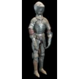 A miniature full suit of armour, in the mid-15th century German style, comprising a close helmet,