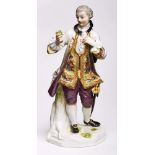 Kavalier mit Blume, Meissen 1910.Galante Standfigur, eine Blüte anbietend. Auf na- turalist.