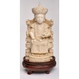 Elfenbeinfigur, China 1. Hälfte 20. Jh.Chinesischer Kaiser auf dem Drachenthron. Elfenbein,