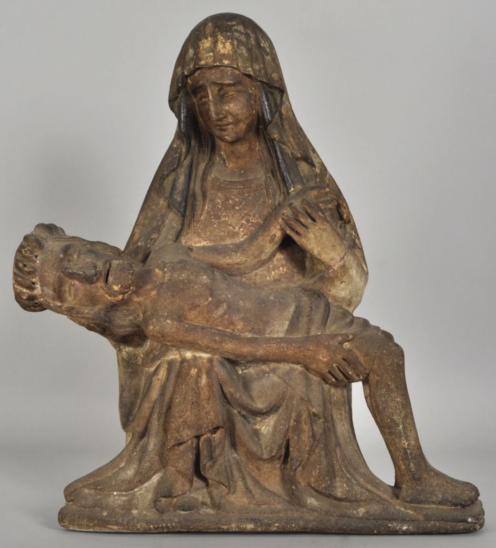 Pietà, Rheinland oder Westfalen, um 1430Kunststein, min. Reste von Farbfassung. Streng pyramidale