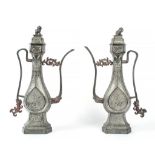 A pair of pewter ewers, 19th century , of Middle Eastern metalwork form with...  A pair of pewter