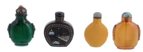A group of four snuff bottles including three glass examples  A group of four snuff bottles