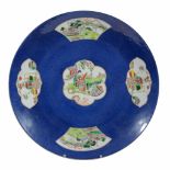 A Chinese blue ground famille verte charger , 19th century  A Chinese blue ground  famille verte