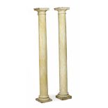 A pair of composition simulated yellow marble pedestals, in George III style  A pair of