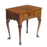 A walnut and featherbanded side table, circa 1740 and later, on cabriole legs  A walnut and