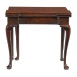 A George II mahogany card table, circa 1740  A George II mahogany card table,   circa 1740, the