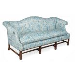 A mahogany framed and upholstered settee in George III style , 20th century  A mahogany framed and