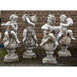 A set of four reconstituted stone garden statues of musical amorini  A set of four reconstituted