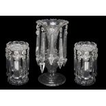 An associated garniture of three cut glass table lustres, late 19th century An associated