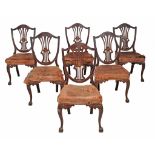 A set of twelve mahogany and marquetry dining chairs in George III style  A set of twelve mahogany