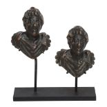 A pair of patinated bronze mounts cast as busts in the Roman taste  A pair of patinated bronze