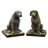 A pair of reconstituted stone garden models of seated hounds  A pair of reconstituted stone garden
