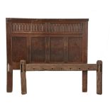 A carved oak bed frame, circa 1660 and later  A carved  oak bed frame,   circa 1660 and later,