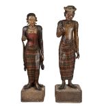 A pair of South East Asian carved and polychrome painted wood figures  A pair of South East Asian