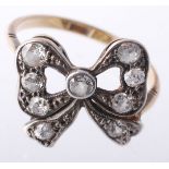 A diamond bow ring, the ribbon bow set throughout with old cut diamonds  A diamond bow ring,   the