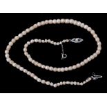 A natural pearl necklace , the ninety two graduated pearls measuring 3.3mm to 5  A natural pearl