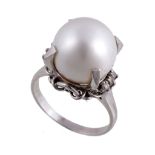 A single South Sea cultured pearl, the 12mm South Sea cultured pearl in a...  A single South Sea