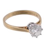 An 18 carat gold diamond single stone ring, the brilliant cut diamond  An 18 carat gold diamond